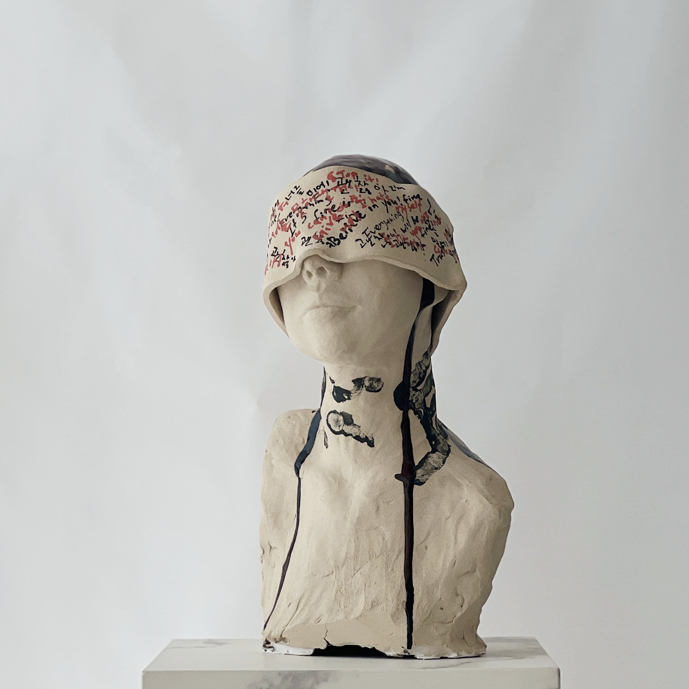 Unseen, 2024, ceramic bust with blindfold